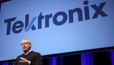 Tektronix president Pat Byrne with the new company logo.