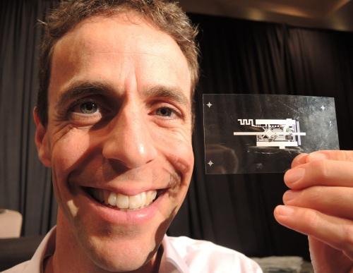 Stein Lundby, a Qualcomm researcher with his prototype plastic sensor platform after a keynote at IDTechEx, held in Santa Clara Calif. (Nov. 18–19, 2015).